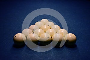 Billiard balls on a blue pool table