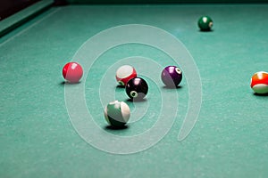 Billiard balls breaking from the impact.the game of pool.the competition
