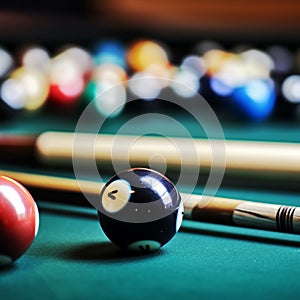 Billiard balls on green billiard table with shallow depth of field