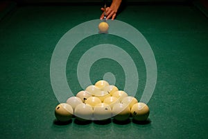 Billiard balls on a green pool table