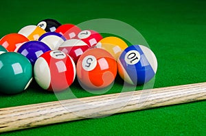 Billiard balls on green table with billiard cue, Snooker, Pool.