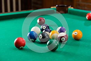 Billiard balls on green table with billiard cue, Snooker, Pool g