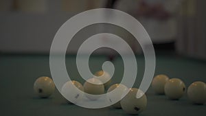 Billiard balls lying on the pool table close up.