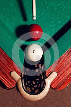 Billiard balls near pocket