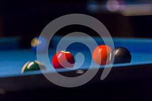 Billiard balls on pool blue table - sport background