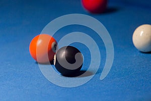 Billiard balls on pool blue table - sport background