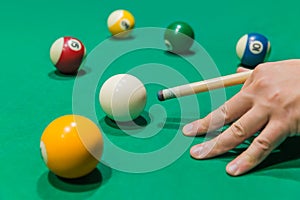 Billiard balls on pool green table