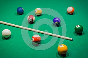 Billiard balls on pool green table