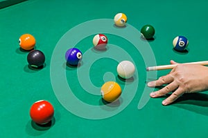 Billiard balls on pool green table