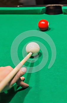 Billiard balls on pool green table