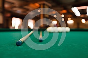 Billiard balls and pool sticks