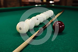 Billiard balls and pool sticks