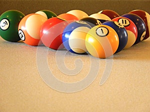 Billiard balls in a pool table