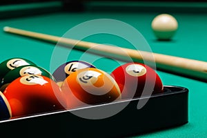 Billiard balls in a pool table