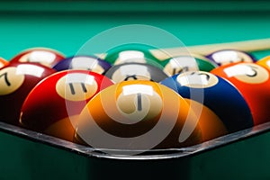 Billiard balls in a pool table