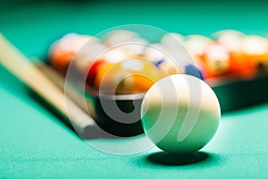 Billiard balls in a pool table.