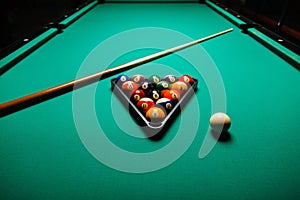 Billiard balls in a pool table.