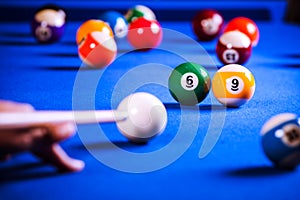 Billiard balls in a pool table