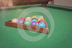 Billiard Balls in a pool table.