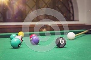 Billiard Balls in a pool table.