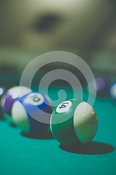 Billiard balls in a pool table. Vintage style noise effect