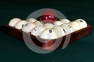 Billiard balls in the triangle on the billiard table. Russian billiard