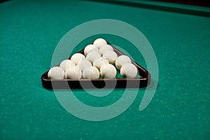 billiard club. gambling table with russian billiard set and cue balls