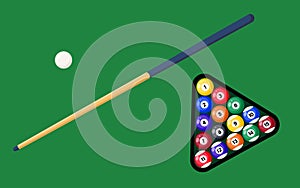 Billiard cue and pool balls in triangle on green table. Billiard balls, triangle and pool stick for game on green table top view.