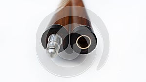 Billiard cues on a white background. Parts of a billiard cue close-up. Live photos of a billiard cue. The Art of Billiards in