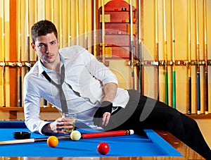 Billiard handsome player man drinking alcohol