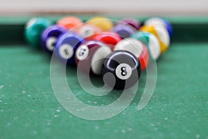 billiard or pool colored balls on a table