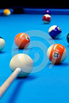 Billiard pool eightball taking the shot on billiard table