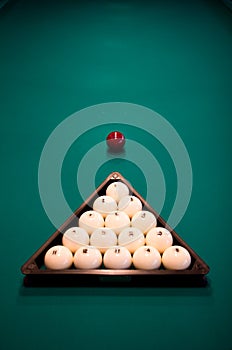 Billiard set on green table