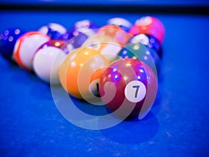 Billiard snooker pyramid balls on pool blue table