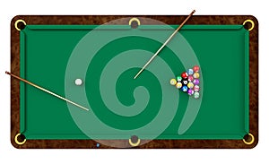 Billiard table with balls and cues