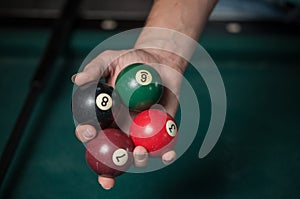 Billiards balls and cue on billiards table. Billiard sport concept