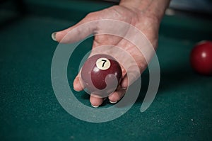 Billiards balls and cue on billiards table. Billiard sport concept