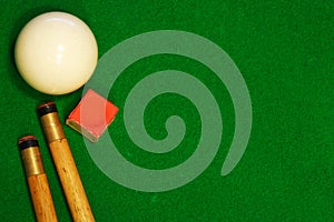 Billiards table cues and cue ball photo