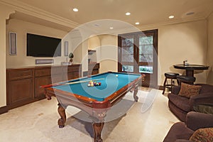 Billiards table in games room