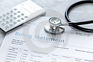 Billing statement for for medical service in doctor`s office background