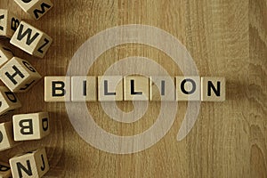 Billion word from wooden blocks photo