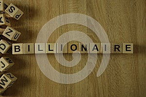 Billionaire word from wooden blocks