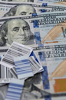 UPC codes against $100 bills background - image photo