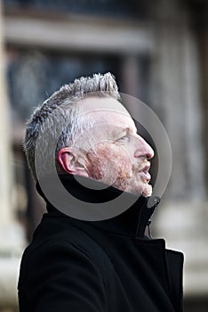 Billy Bragg in front of Exeter Cathedral