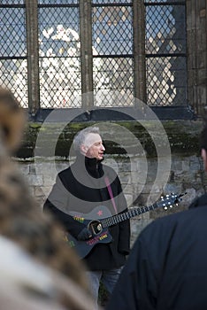 Billy Bragg in front of Exeter Cathedral
