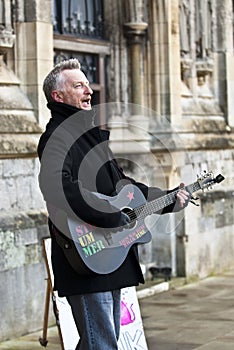 Billy Bragg in front of Exeter Cathedral