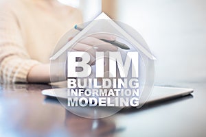 BIM - Building information modeling concetp on virtual screen.