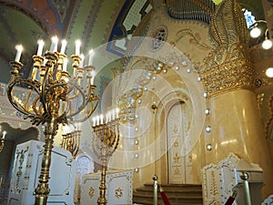 Bima, an elevation usually in the center of the synagogue, where there is a special table for public reading of the