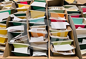 bin box multiple documents waiting to be shredded.AI Generated