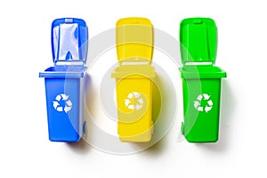 Bin collection. Yellow, green, blue dustbin for recycle plastic, paper and glass can trash isolated on white background. Container